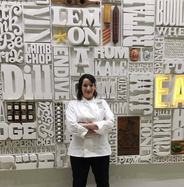 Portrait of Megan Larkin ’17 at her graduation from the Culinary Institute of America