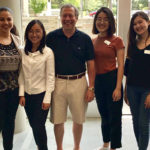Photo of Aida Scarpati; Tiang Xiao; Coach Ed Evans ’74 , MBA ’75, VP and chief human resources officer at Four Seasons Hotels and Resorts; Yiting Wang; and Alice Wu.