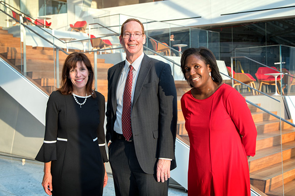 Photo of the three deans inside the Tech Campus