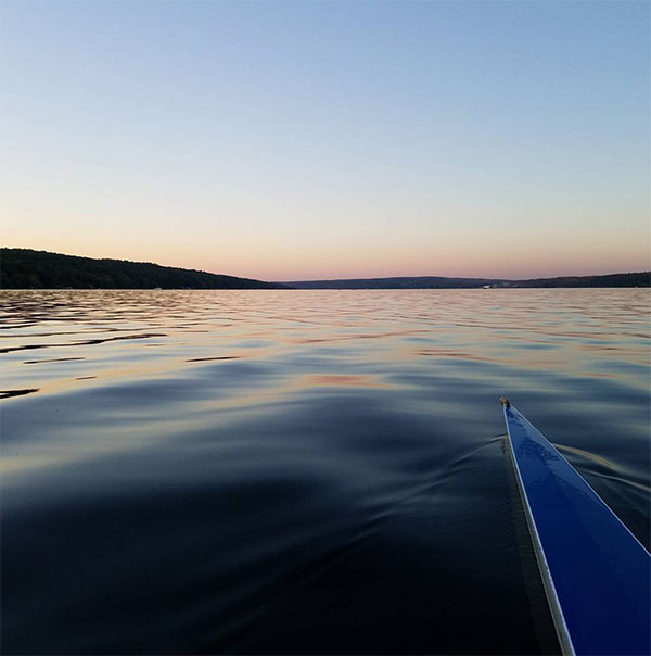 Rowing at Cayuga lake in the sunset