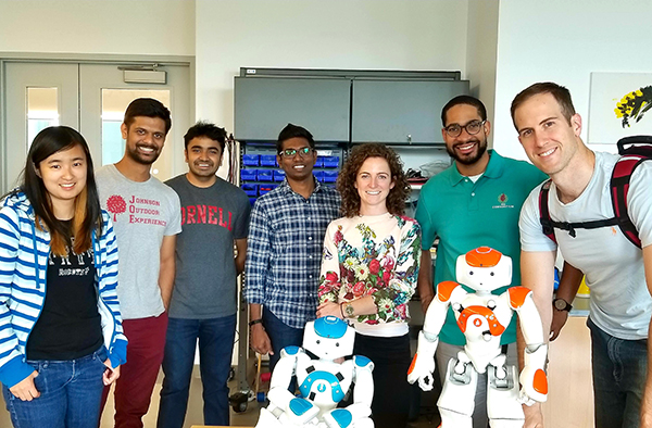 From left to right: Kai Weng (Catherine) Wong, PhD; Arunprasad Iyer, MBA ’19; Mukul Mohan Aggarwal, MBA ’19; Mani Selvam, MBA ’18; Madeleine Mcdougall, MBA ’19; Earl Allen Roach III, MBA ’19; and William Charles Storey, MBA ’19, working on commercializing an early-stage, university-generated technology as part of Big Red Tech Strategy.