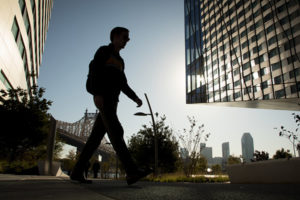 Photo of student walking through Cornell Tech.