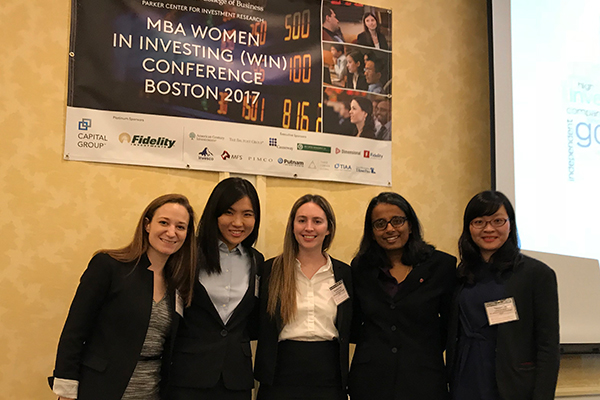 Photo of 2017 WIN Conference attendees with Lakshmi Bhojraj (fourth from left), director of the Parker Center for Investment Research.