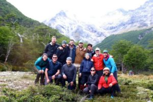 Group photo of MBAs in front of a mountain in Patagonia, Chile