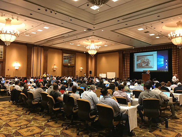 Photo of Americas students in a conference room during their residential session