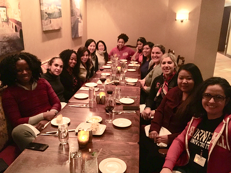 Photo of women Metro NY students at a restaurant during residence week