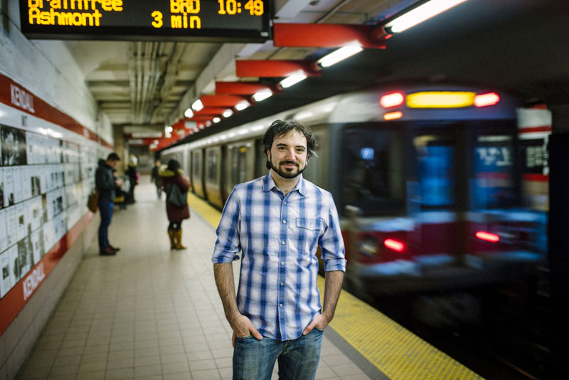 Photo of Falco standing on a subway platform