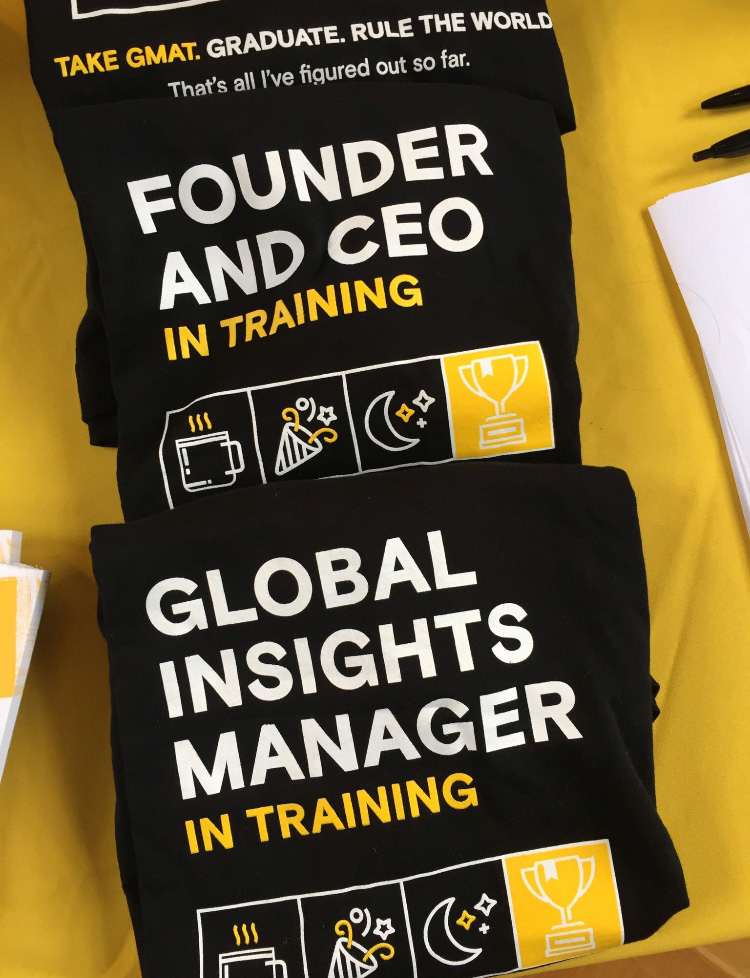 Photo of shirts that say Founder and CEO in Training and Global Insights Manager in Training