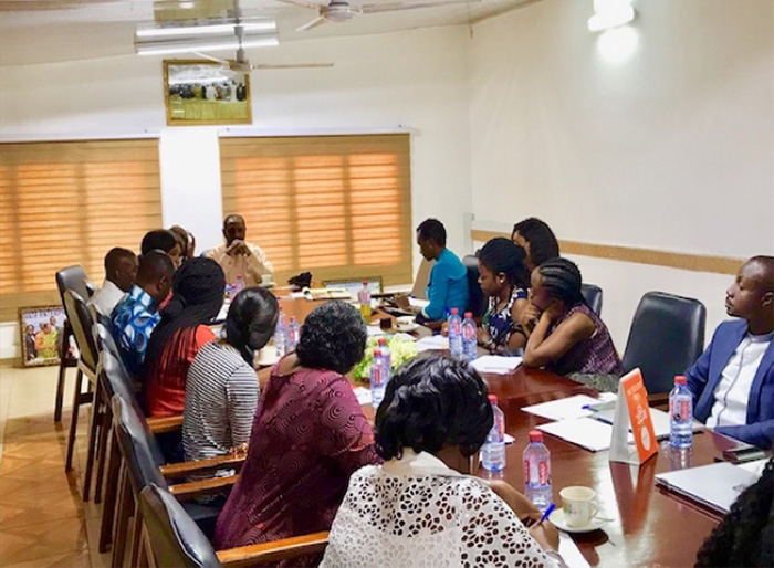 Photo of a group sitting around a table