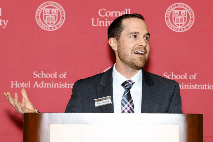 Photo of Andrew Quagliata at a podium