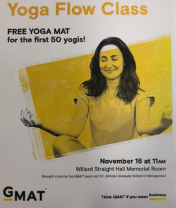 Photo of a poster with a female student that says Yoga Flow Class