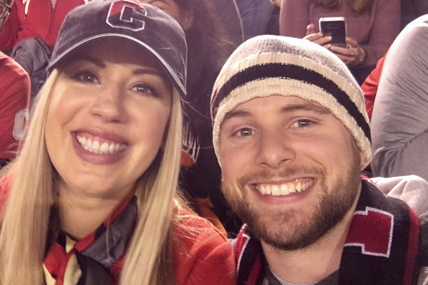 Photo of Nick and Katie Meyer wearing Cornell clothing