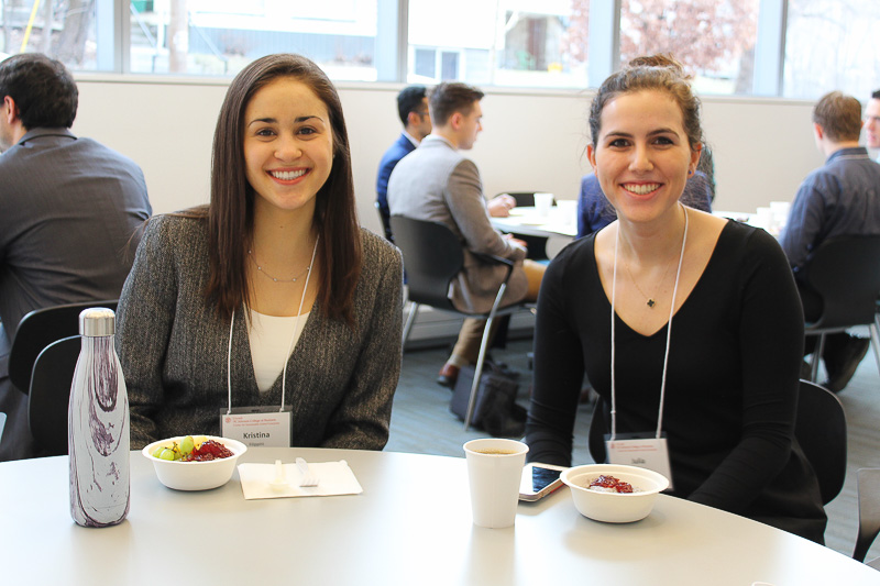 Photo of two women sitting at a table