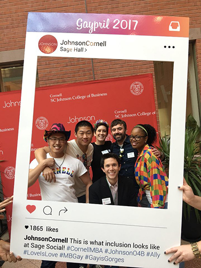 Photo of students standing in an Instagram cutout that says: This is what inclusion looks like at Sage Social