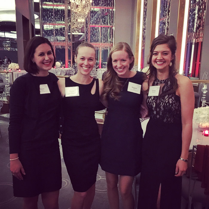 Photo of Emily and three other women dressed in gala attire