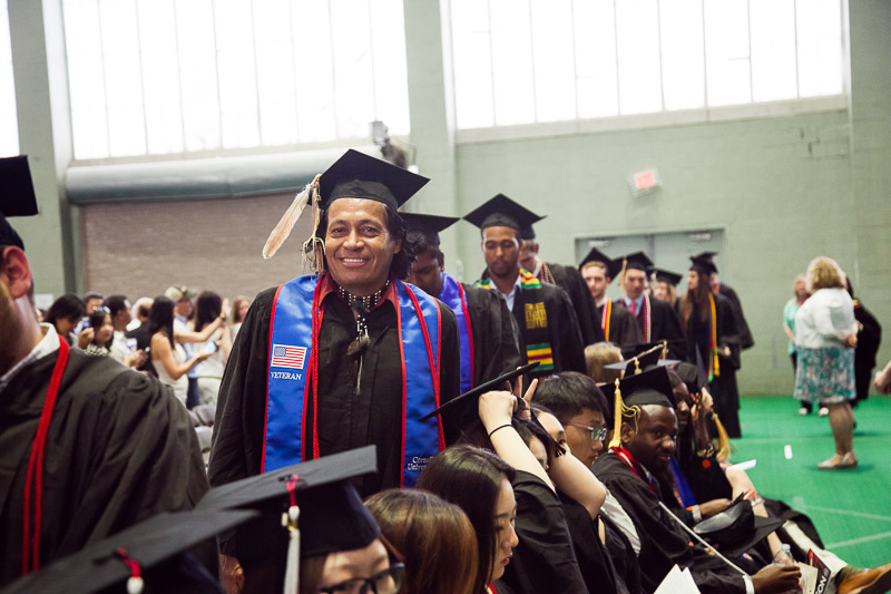 Photos of graduates walking to their seats