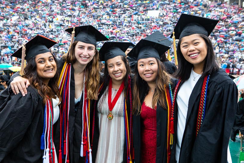 Photo of five graduates