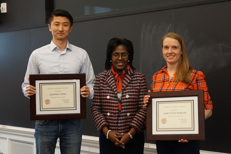 Photo of Jianwei, Lynn, and Mary Kate holding certificates