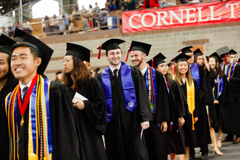Photo of graduates walking into the ceremony