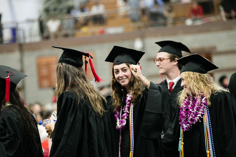 Photo of a waving graduate