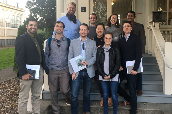 Photo of students standing outside on a staircase