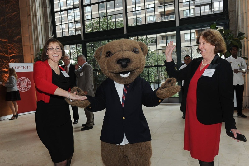 Photo of Touchdown and two women giving him high-fives