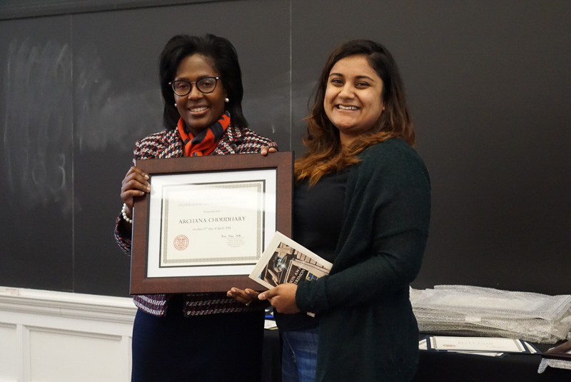 Photo of Lynn and Archana holding a certificate