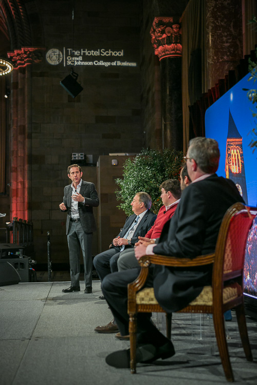 Photo of Richard and the panel on stage