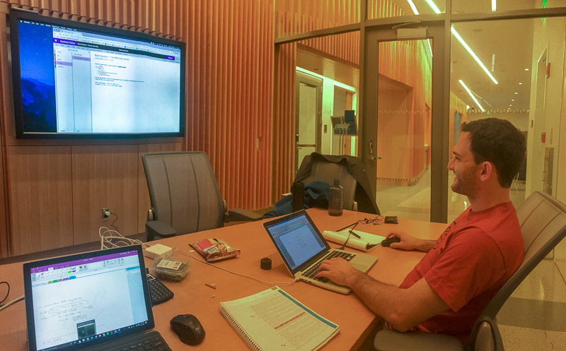 Photo of a man studying in a breakout room