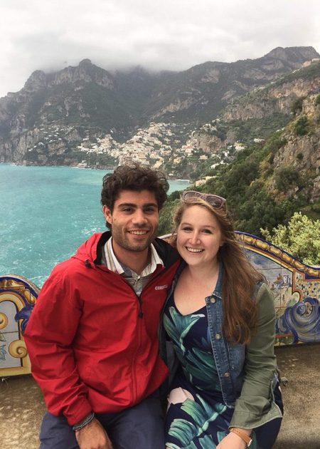 Photo of Charlotte and a male student overlooking a body of water