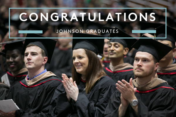 Photo of seated graduates that says Congratulations Johnson graduates