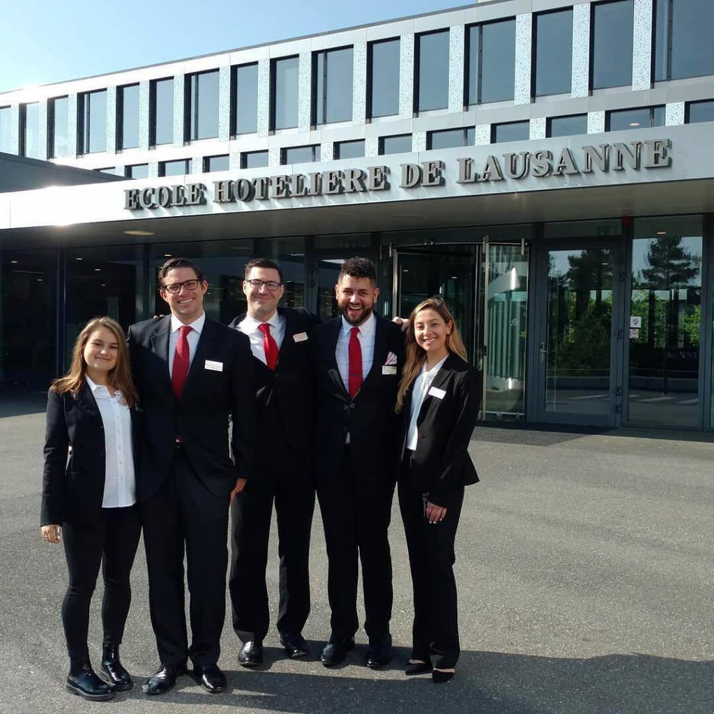 SHA students standing outside Ecole Hoteliere De Lausanne