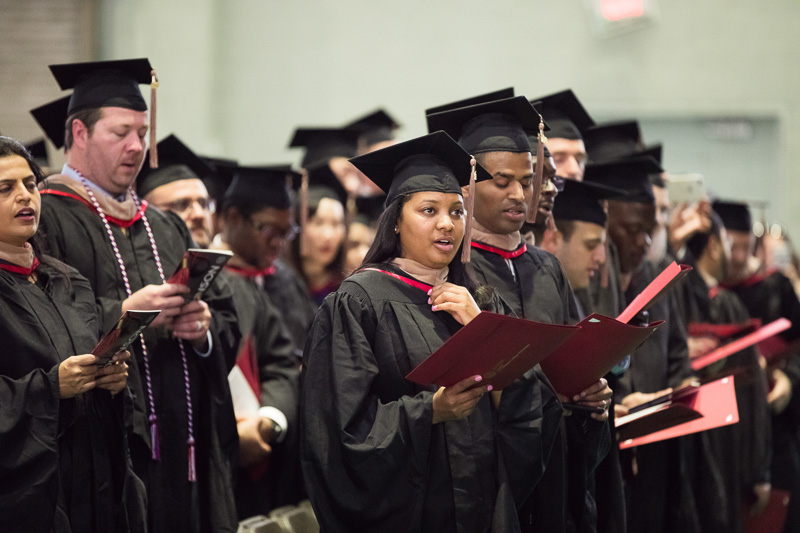 Photo of singing graduates