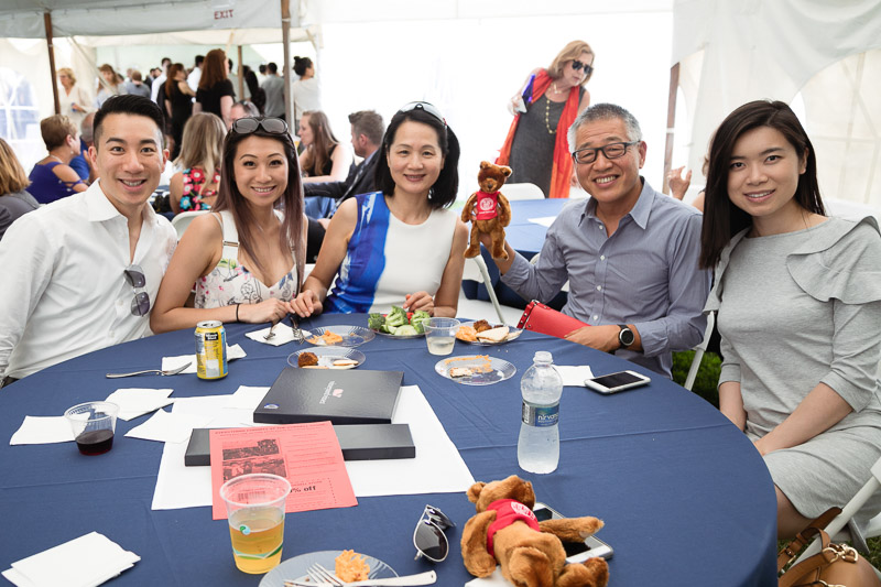 Photo of a family sitting at a table