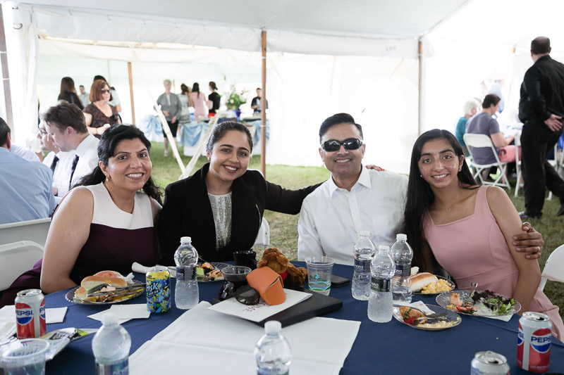 Photo of a family sitting at a table