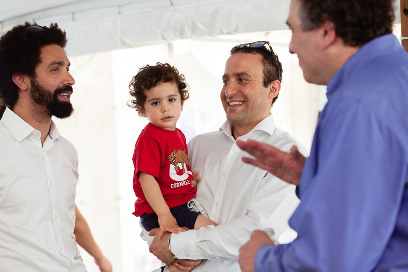 Photo of a man holding a child