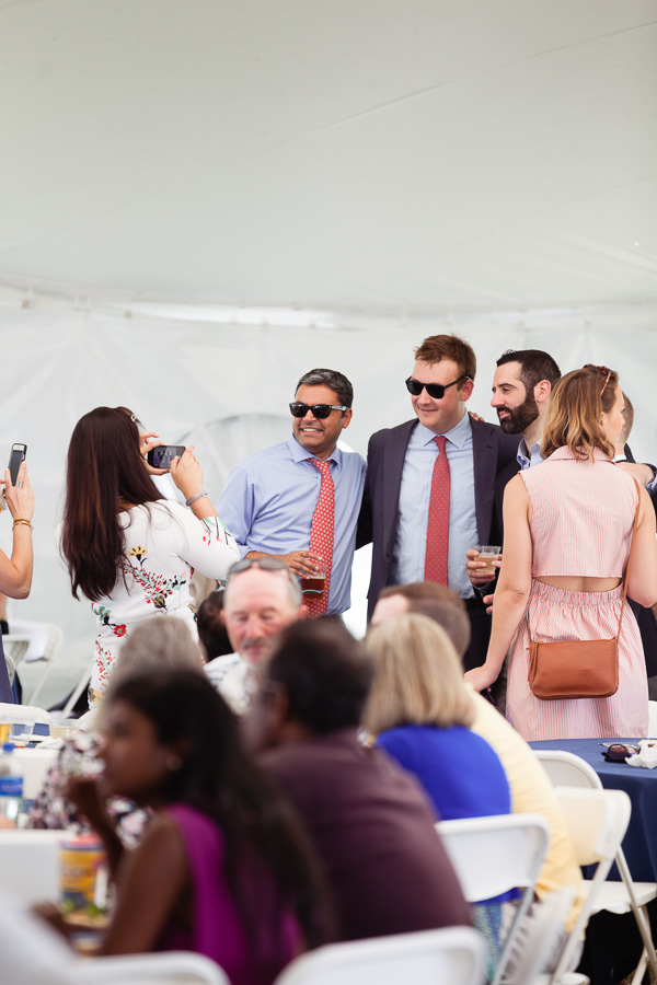 Photo of graduates wearing sunglasses