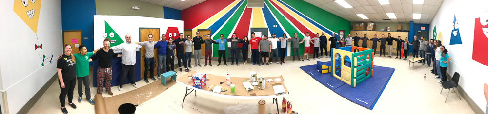 Photo of a panoramic shot of the group and the complete playroom