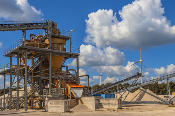 Photo of a sand quarry and heavy equipment