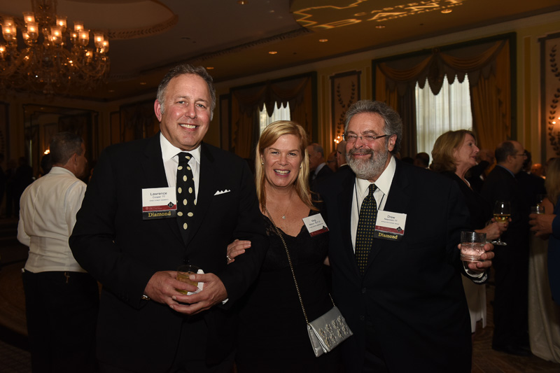 Photo of three people in the banquet hall