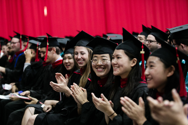 Photo of MMH graduates sitting at Commencement