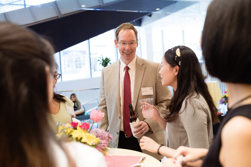 Photo of Dean Nelson talking to attendees