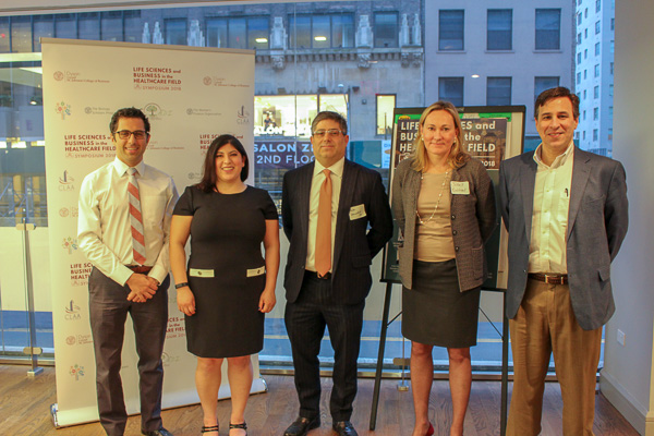 Photo of the panelists and moderator