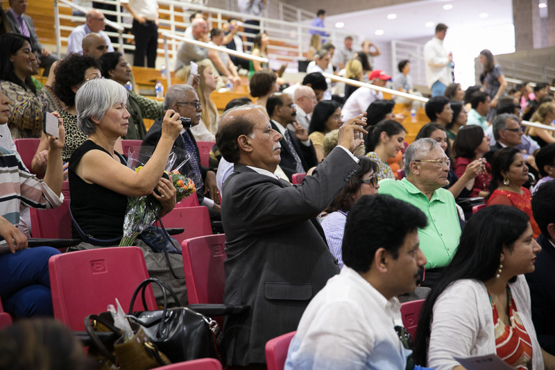 Photo of families taking pictures