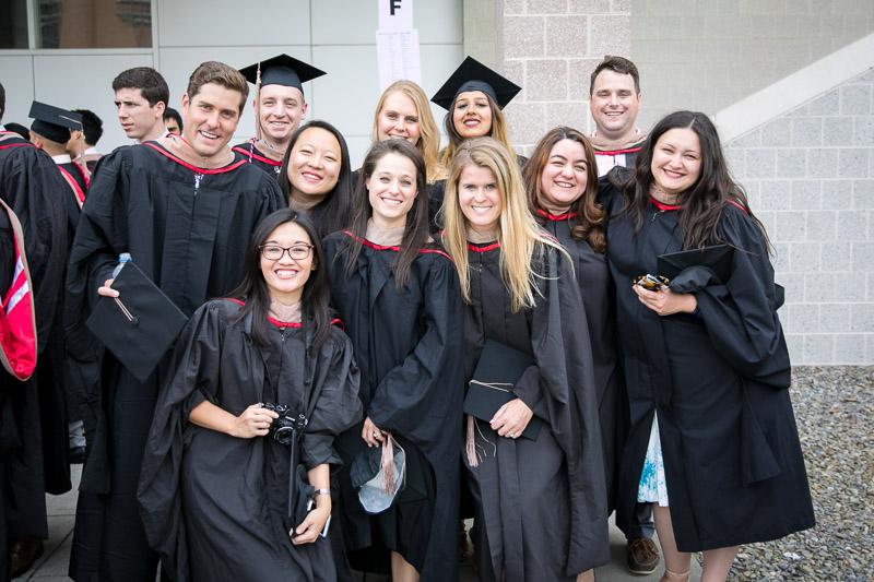 Photo of grads posing for a picture