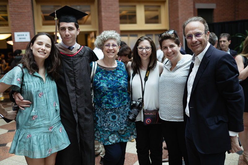 Photo of a graduate and his family