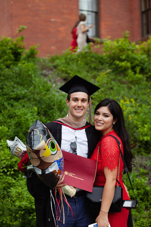 Photo of a male graduate and a woman