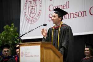 Photo of James at the podium