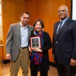 Photo of Lele with her son, Abhijeet, MBA ’89, and Ralph Christy, professor and director of Cornell’s International Institute for Food, Agriculture, and Development.
