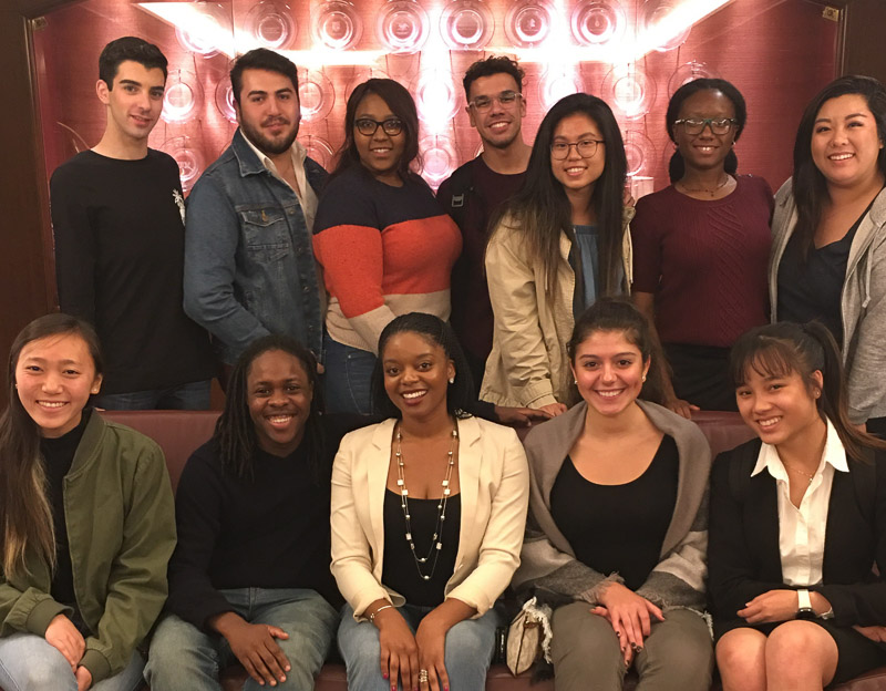 Photo of a group of people in the Statler Hotel lobby